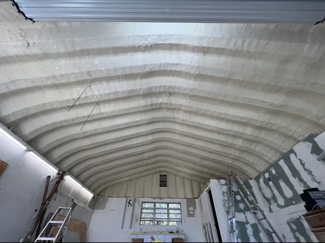 Spray polyurethane foam applied to the underside of a metal roof deck in Pollock Pines